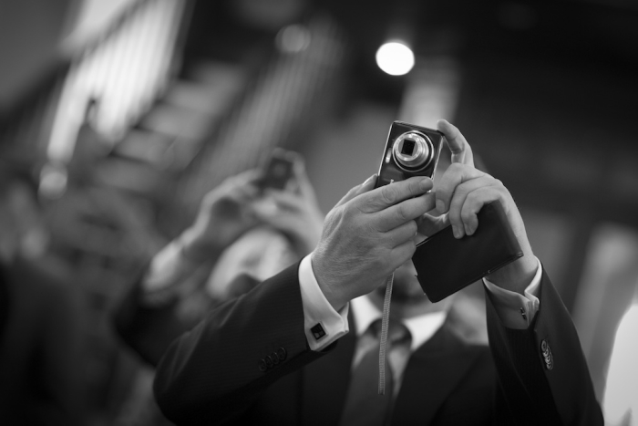 wedding guests taking photos